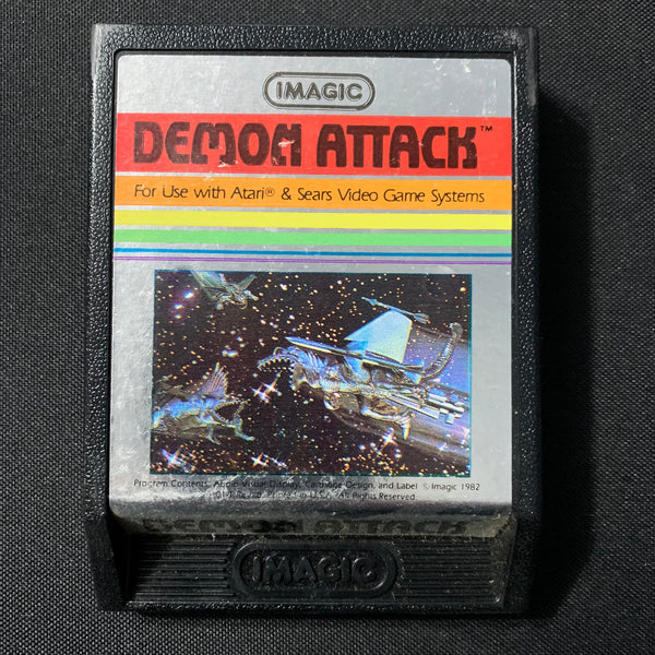 ATARI 2600 Demon Attack tested graphic label Imagic video game cartridge 1982